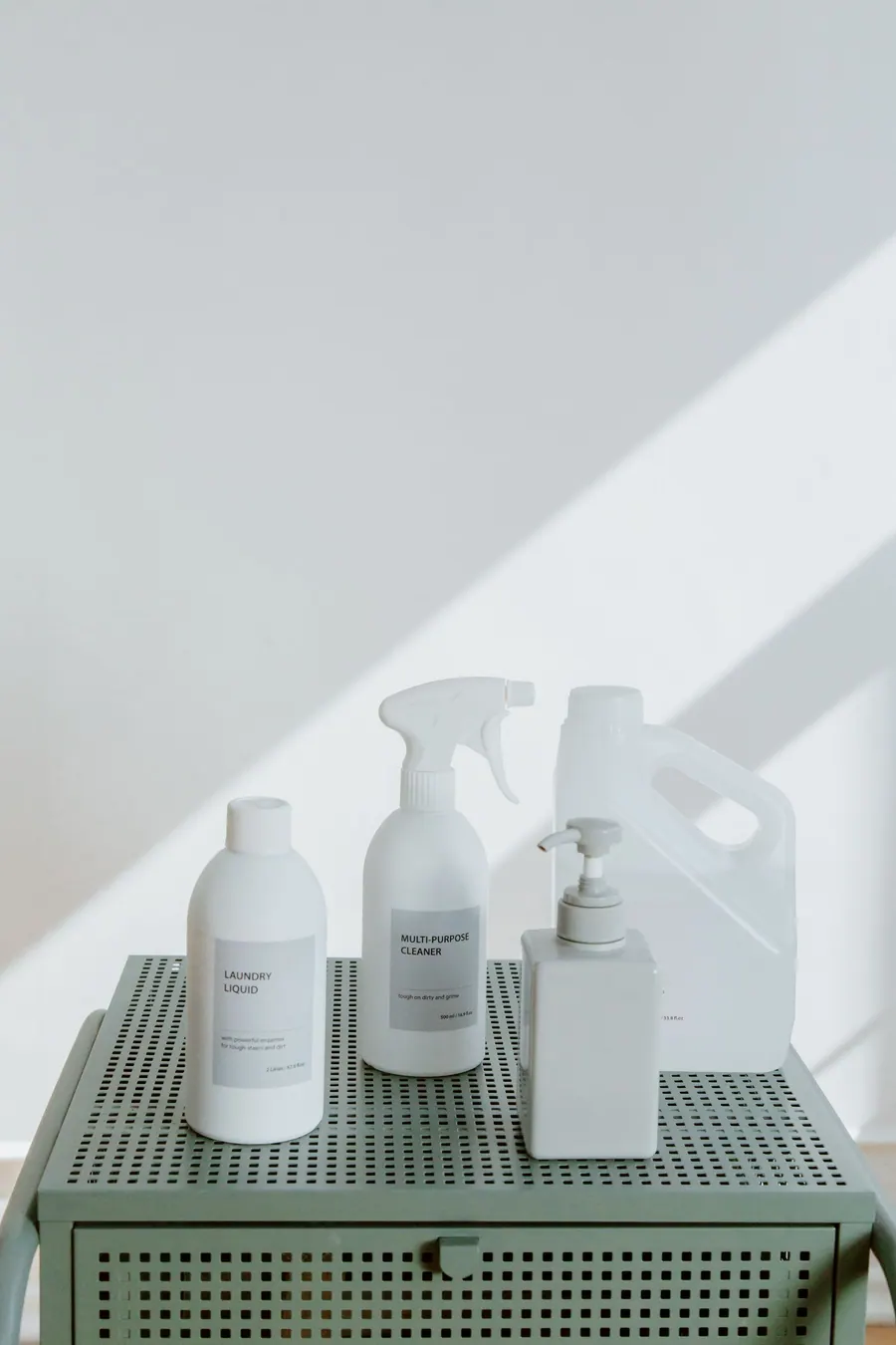 Cleaning supplies arranged in a clean office-style setting