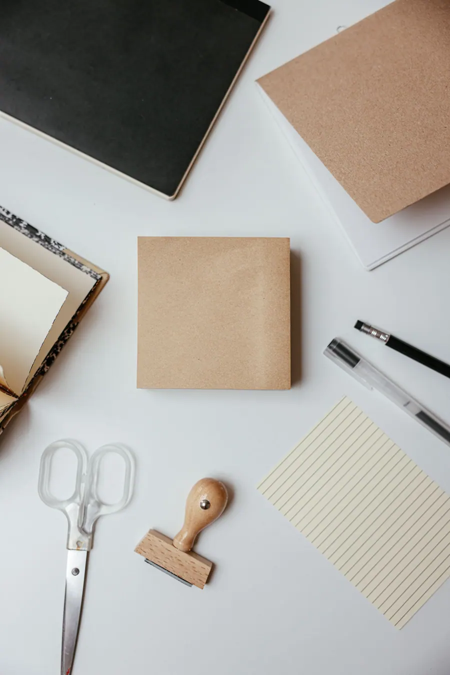 Stationery items arranged on an office desk